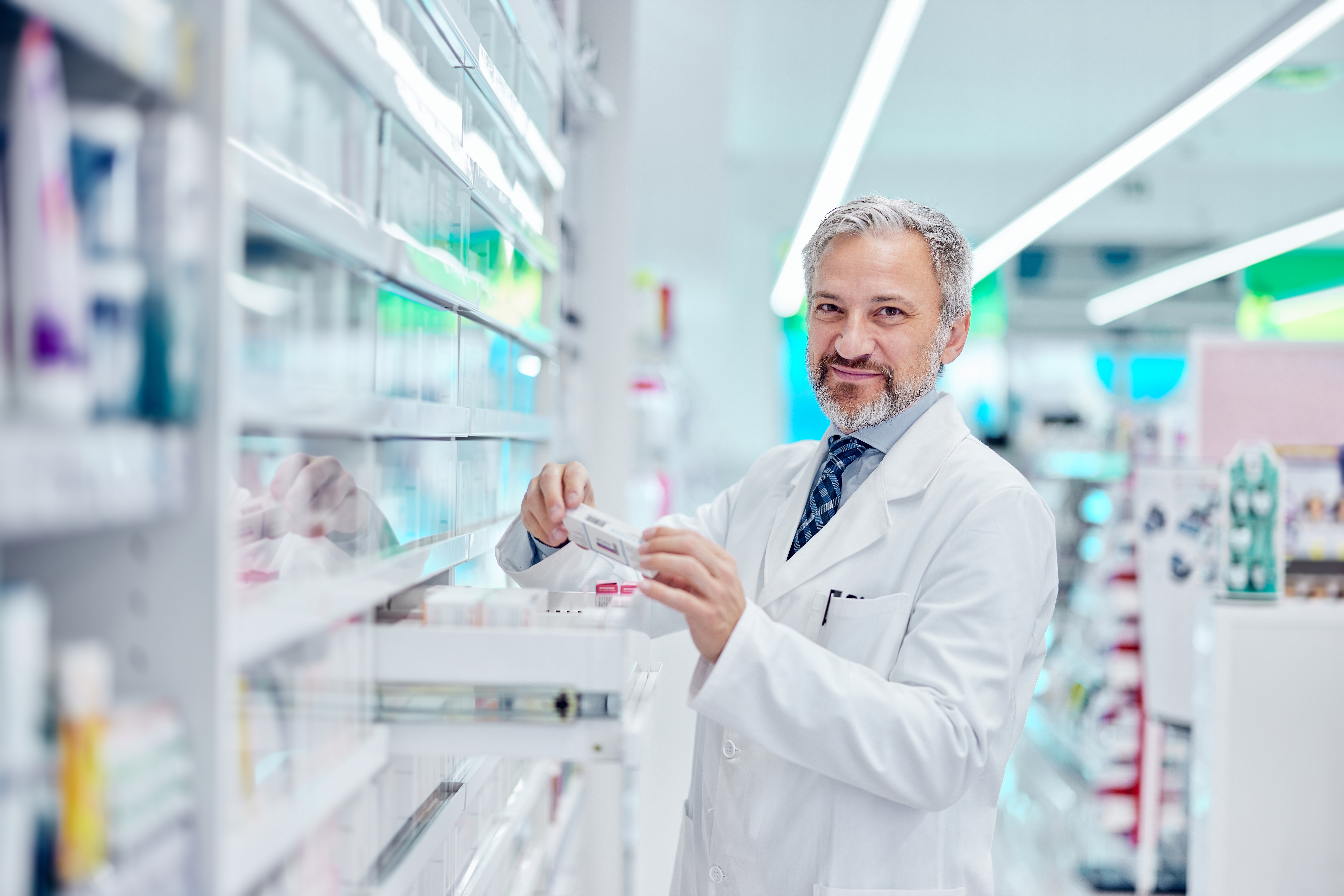 Smiling,Male,Pharmacist,Working,Alone,,Taking,A,Box,Of,Medicine Smiling,Male,Pharmacist,Working,Alone,,Taking,A,Box,Of,Medicine